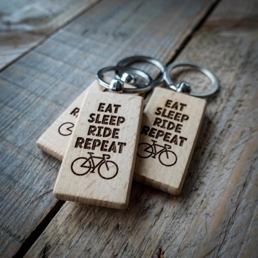 EAT SLEEP RIDE REPEAT WOODEN KEYRING