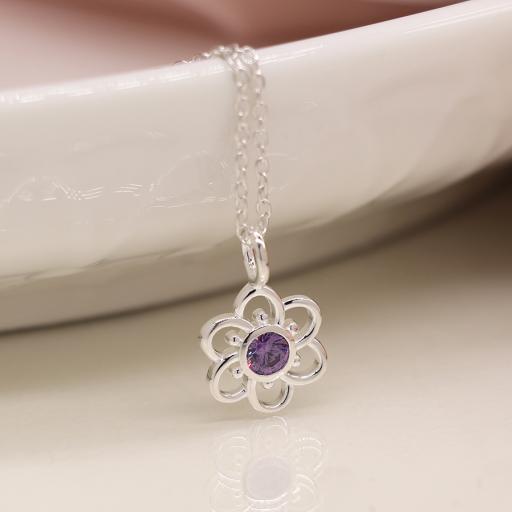 PEACE OF MIND STERLING SILVER CRYSTAL FLOWER PENDANT