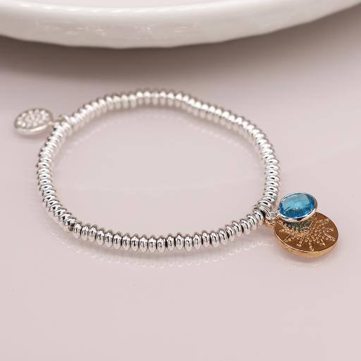 PEACE OF MIND SILVER PLATED BEAD BRACELET, WITH GOLD DISC AND AQUA CRYSTAL
