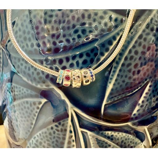 PEACE OF MIND SILVER PLATED MULTI RING BRACELET