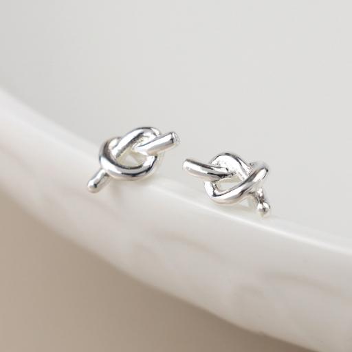 SILVER PLATED TINY KNOT STUDS BY PEACE OF MIND