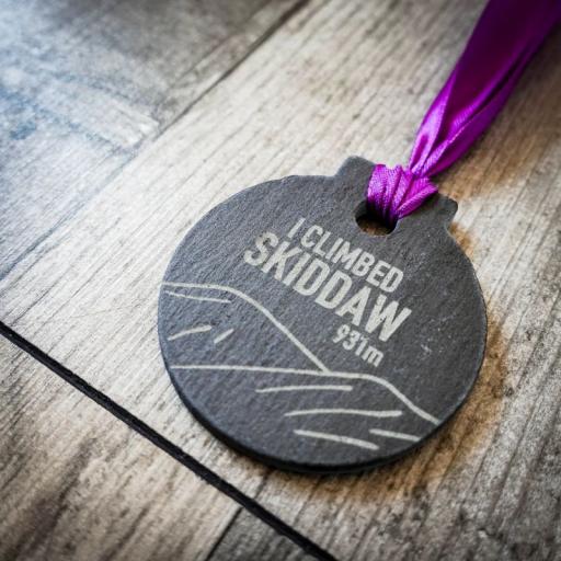 SKIDDAW SLATE MEDAL ON PURPLE RIBBON